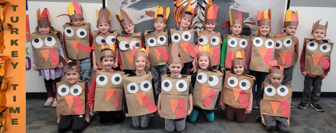 Students with turkey costumes they made